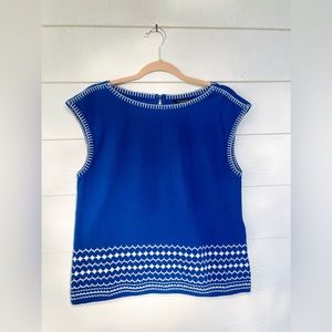 Banana Republic blue top with white embroidered detailing. Size small